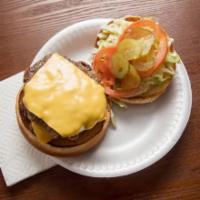 Deluxe Burger  · Half lb ground meat per pattie. All sandwiches are dressed. Mayonnaise, lettuce, tomato, and...
