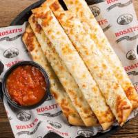 Cheesy Bread Stix · Breadsticks topped with garlic butter and mozzarella cheese and served with a side of marina...