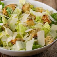 Caesar Salad · Crisp Romaine lettuce hearts, toasted garlic croutons and shaved Asiago cheese. 