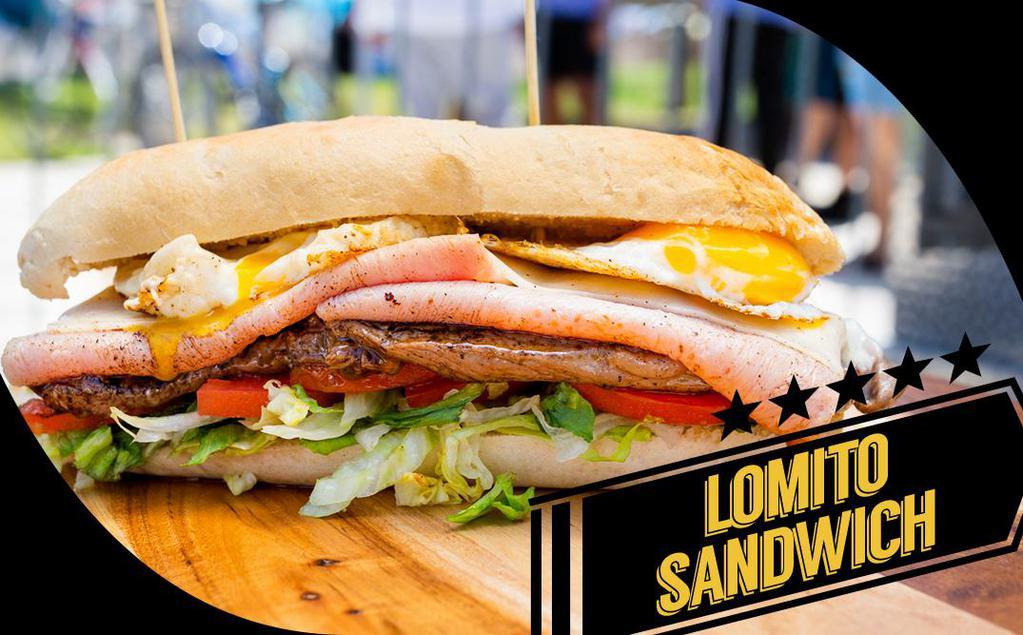 Lomito Sandwich  · A thinly sliced churrasc steak grilled topped with mozzarella cheese, ham, grilled egg, bacon, lettuce, tomoto, chimichurri sauce and French baguette with side of fries.