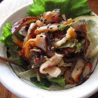Squid Salad (Ika Sansai) · Seasoned squid, kaiwari and sesame seeds