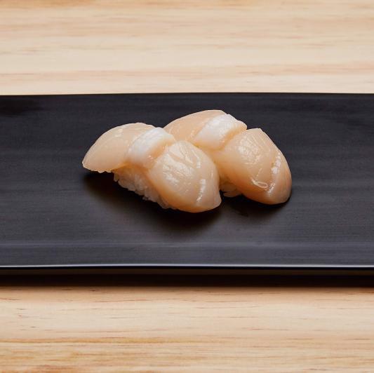 Hotate (Scallop) Nigiri · Scallops. 
These menu items are raw or undercooked. Consuming raw or undercooked meats, poultry, seafood, shellfish, or eggs may increase your risk of foodborne illness, especially if you have certain medical conditions.