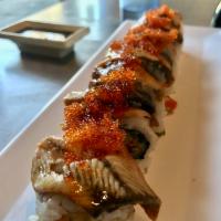 Unagi Lover Roll · Inside and outside unagi with avocado and tobiko on top. 
These menu items are raw or underc...