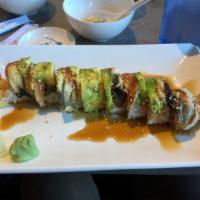 Country Girl Roll · Real crab, shrimp tempura, eel, avocado, and sweet sauce. 
These menu items are raw or under...