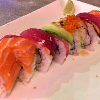 Dragon Roll · Avocado, cucumber, cooked shrimp, tuna, salmon, and eel. 
These menu items are raw or underc...