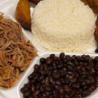 Pabellon · White rice, shredded beef, sweet plantain and black bean.