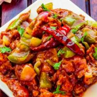 Chilli Chicken · A south-east asian staple of crispy batter fried chicken chunks tossed in a spicy mix of gar...