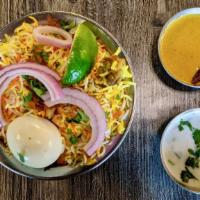 SpiceUp Andhra Chicken Biryani · Spiceup! Andhra style chicken biryani is a spicy flavored rice with marinated chicken that c...