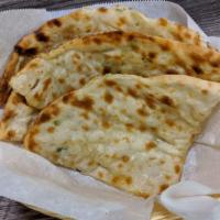 Aloo Kulcha · Aloo Kulcha Recipe is one of the most popular North Indian flat breads. Crisp on the outside...