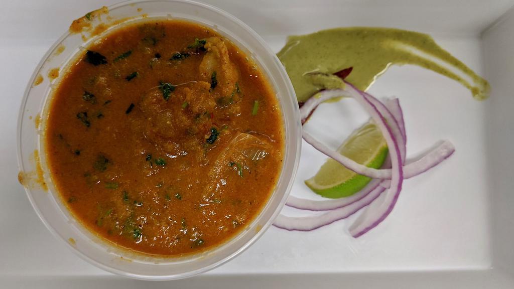 SpiceUp Andhra Chicken Curry · Chicken braised in yogurt and cream, cooked in maety stock, and seasoned to taste - all to produce a mouth watering spicy curry.