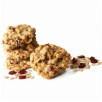 Oat Cranberry Walnut Cookie · This is our number one selling oatmeal cookie. Tart cranberries and crisp walnuts stud this ...