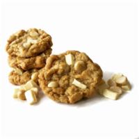 White Chocolate Macadamia Nut Cookie · Our classic buttery dough studded with creamy white chocolate chunks and macadamia nut halves.