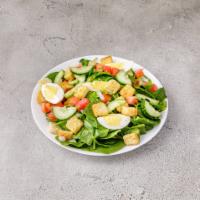 House Salad · Spinach, cucumber, tomato, onion, egg, cheese and croutons.