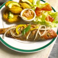 Fried Fish, Rice, Plantains and Salad · Fried fish Rice and beans salad sause, pikkiz and fried plantains