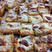 Pizza Bread · On toasted garlic bread topped with marinara, & mozzarella & Parmesan cheese.