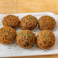 1. Falafel · 6 pieces. Deep-fried chickpeas shaped in round ball made from fresh beans and vegetables.