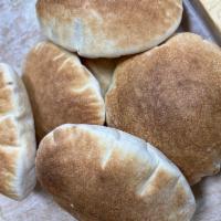Pita bread  · Daily Freshly baked pita bread 
6 pieces 