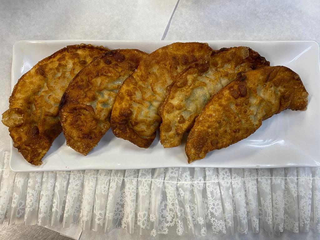 Fried Pork Dumpling 군만두 · Filled dough. 