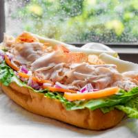 Townie Turkey Club · Boar's Head Oven gold turkey, American cheese, bacon, lettuce, tomato, red onion and mayonna...