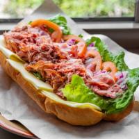 Bunker Hill Beef · Roast beef, low sodium ham, cheddar, lettuce, tomato, red onion and horseradish on your choi...