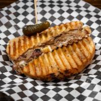 Pig Destroyer Sandwich  · Havarti, muenster cheeses, sauteed maui sweet onions, and a generous portion of kalua pork o...
