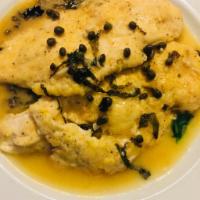 Chicken Piccata · Capers, spinach in a lemon wine sauce.