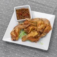 A5. Fried Chicken Wings · 6 pieces. Seasoned, deep-fried wings with sweet and sour sauce or chili sauce. Please add in...