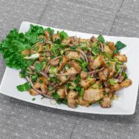 S6. Pork Belly Larb Salad · Onion, cilantro, scallion, rice powder, and lime juice.