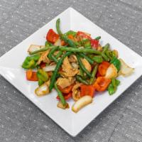 F1. Pad Prig King · Stir-fried with bell peppers, green bean, and onions with spicy curry paste. Add pork belly ...