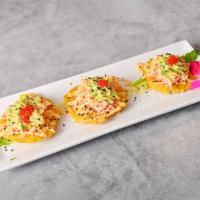 EBI Tsu · Fried plantain portions topped with shrimp, krab mix and avocado served with spicy mayo and ...