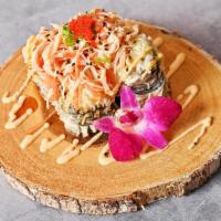 Volcano Roll · Krab, avocado, cream cheese, masago, scallion, tomato and sesame seeds served deep fried wit...
