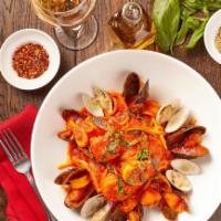 Linguini Frutti di Mare · Tossed linguini pasta with calamari, scallops, shrimp, mussels and clams in a traditional sp...