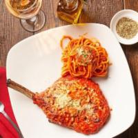 Veal Chop Parmesan · Breaded veal chop topped with mozzarella cheese & marinara sauce
