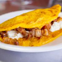 Cachapa con Chicarron · Corn sweet cakes with Guayanese cheese and fried pork belly.