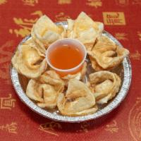 7. Crab Rangoon · 8 pieces. Fried wonton wrapper filled with crab and cream cheese.