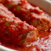 Italian Sausage · 2 savory Italian sausage links simmered in our signature tomato sauce.