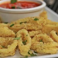 Fried Calamari · Lightly battered calamari rings with a hint of lemon pepper seasoning, fried, and served wit...
