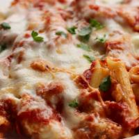 Baked Ziti · Penne pasta blended with ricotta cheese and tomato sauce, topped with mozzarella and baked t...