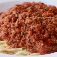 Spaghetti with Meat sauce · Thin spaghetti noodles tossed in our savory homemade meat sauce and served with 3 garlic rol...