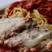 Chicken Parmigiana · Hand-breaded chicken breast simmered in our signature  tomato sauce, topped with mozzarella ...