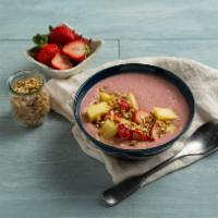Breezy Smoothie · Blended yogurt, banana and strawberry, topped with strawberries, pineapples, granola, and ho...