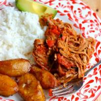 Carne desmechada  · Pulled beef whit rice, beans, sweet plantains, eggs and salad 