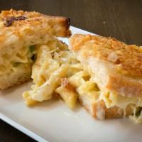 Totally Cheesy Mac Melt  · Creamy mac and cheese, white cheddar, mozzarella and green onions on our signature salt and ...