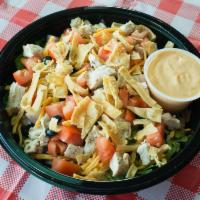 Southwest Chopped Salad · Mixed greens, black beans, corn, red onions, chicken, tomatoes, cheddar cheese and tortilla ...