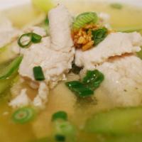 B9. Chicken Rice Soup · Savory light broth with rice and chicken. 