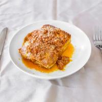Lasagna Bolognese · Traditional homemade lasagna pasta prepared in layers of besciamella cream, bolognese meat r...