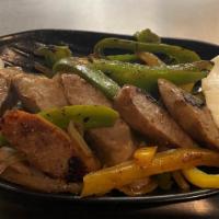 Sausage and Peppers · Grilled Italian sausage served on a platter with Peppers, and onions and fresh mozzarella