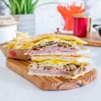 Cuban Sandwich · Ham,Roasted Pork,Swiss Cheese,Pickles and Mustard On Cuban Bread