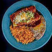 2. Two enchiladas · Two enchiladas filled with cheese, chicken or beef, covered with delicious enchilada sauce and shredded cheese
Served with rice and beans