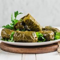 Dolma · Grape leaves stuffed with rice and spices.